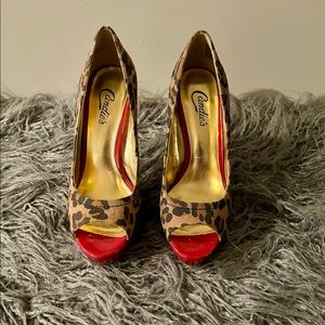 Brand New…Leopard print pumps with red accent!